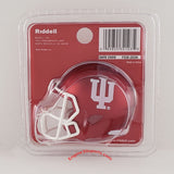 Riddell pocket size Indiana University football helmet in its original blister packaging, featuring a crimson red helmet with a white IU logo and white face mask.