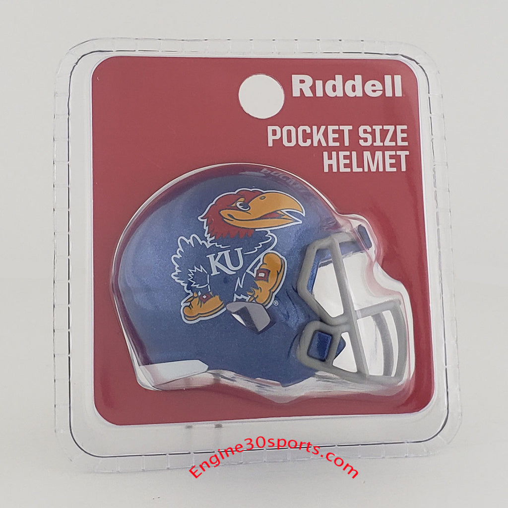 Riddell pocket size helmet featuring the Kansas Jayhawks logo, in its original blister pack packaging with a red backing card.