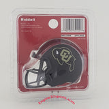 Riddell pocket size helmet in its original blister packaging, featuring a black football helmet with a gold and white 'CU' logo on a red backing card.
