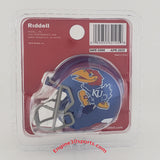 Riddell pocket size helmet featuring the Kansas Jayhawks logo, in its original blister pack packaging with a red backing card.